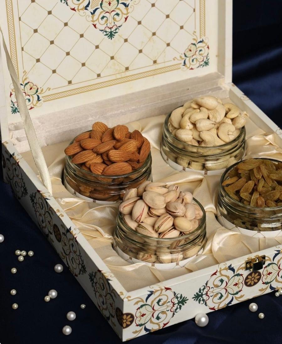 Wooden box with assorted dry fruits and nuts